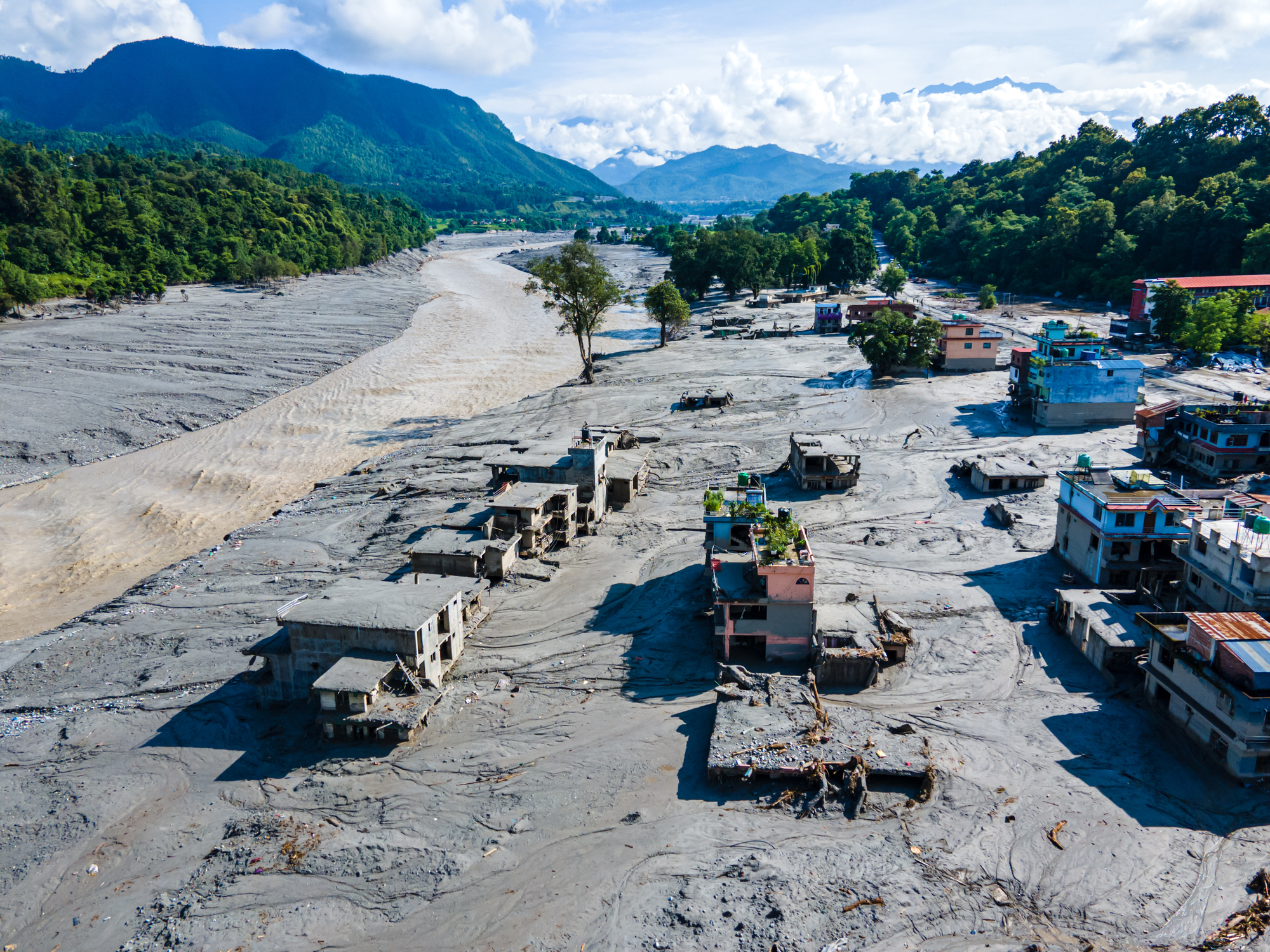 An aerial view shows the aftermath of massive flooding along the Bhotekoshi River, which affected low-lying areas and settlements near the riverbanks in Devighat, Nuwakot, Nepal